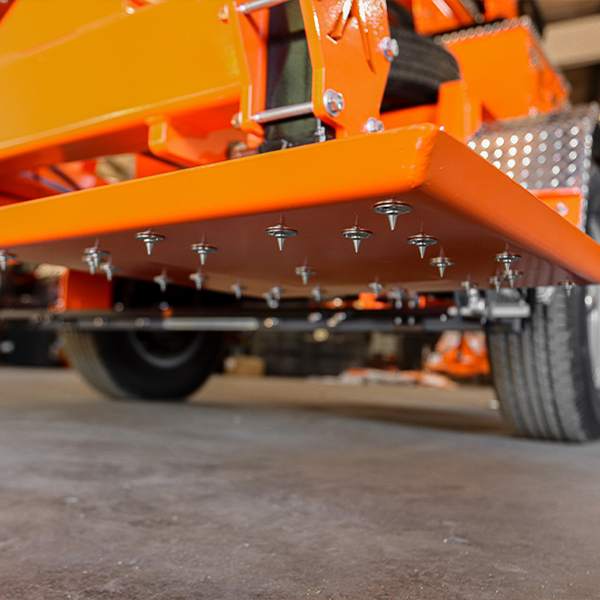 Malta Dynamics X500A ice pads, oversized studded outrigger feet for traction on snow and ice
