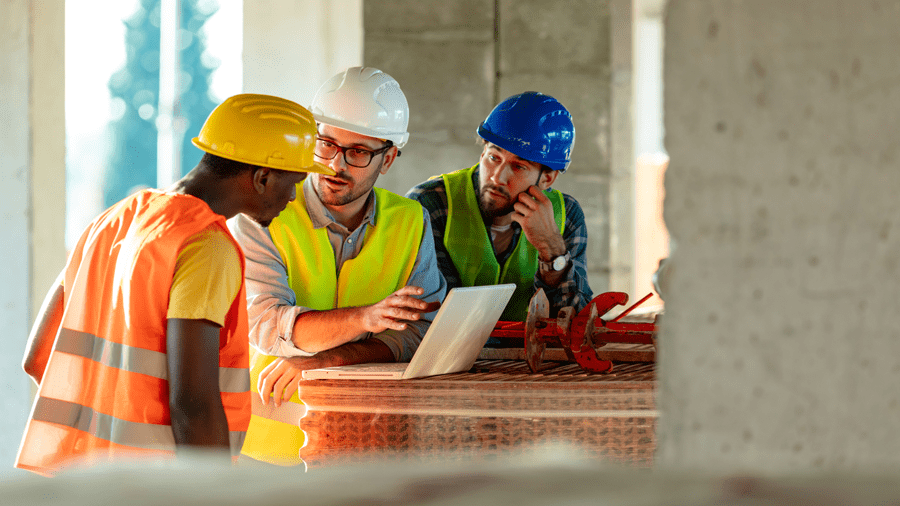 Safety meeting with worker and safety manager.