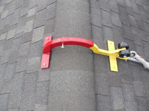 RidgePro attached to roof peak for fall protection.