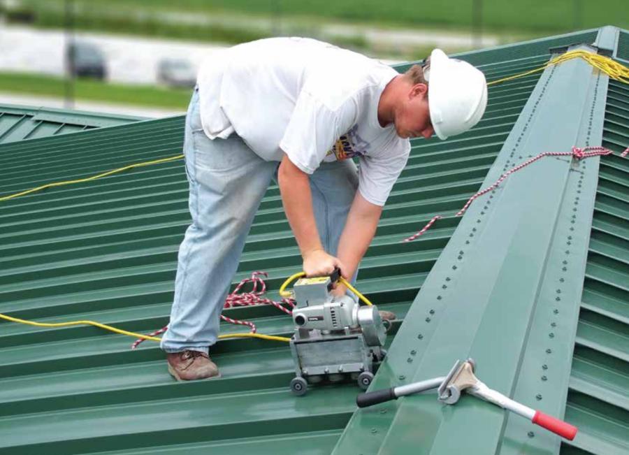 Behlen standing seam panels being seamed. Image courtesy of www.behlenmfg.com.