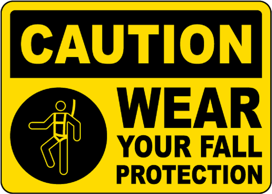 Caution Wear Your Fall Protection warning sign on a jobsite.