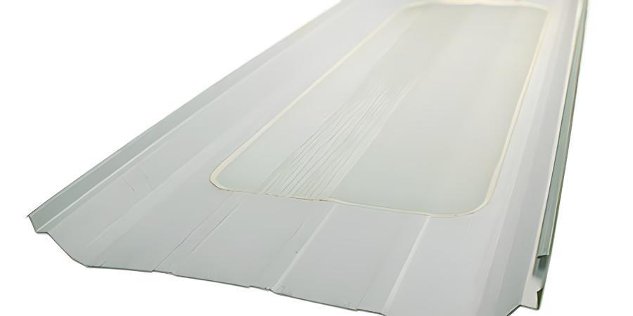 Profile image of the CBC SS360 translucent panel. Manufactured with fiberglass-reinforced materials to match the SS360 metal profile, this panel allows natural light into buildings but requires specialized peak-mounted fall protection rather than seam clamps. Image courtesy of www.cbcsteelbuildings.com.