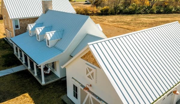 Technical profile of the Universal Standing Seam 24-gauge steel panel illustrating the 1.5-inch seam height and nailstrip fastening design; image courtesy of www.ClassicMetalRoofingSystems.com.