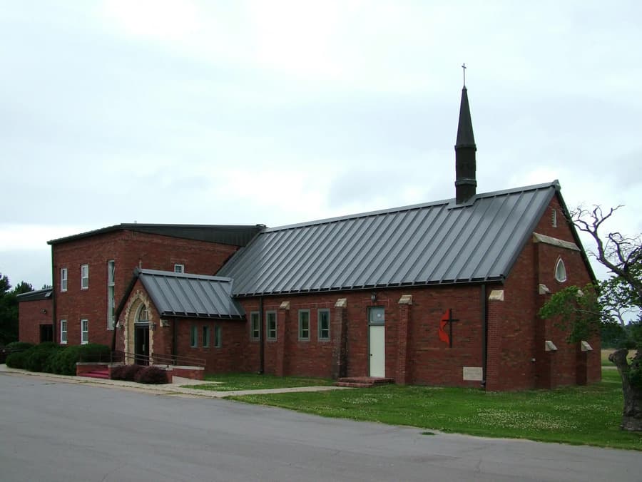 Behlen standing seam panels on a church. Image courtesy of www.behlenmfg.com.