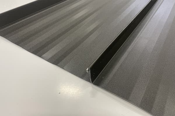 Architectural profile of the GNMC 2-inch Mechanical Lock panel, engineered for long spans and harsh Montana winters; image courtesy of www.GNMCUSA.com.