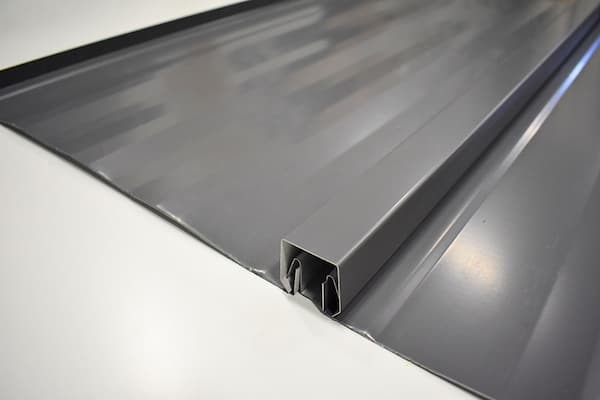 Aesthetic profile of the GNMC Snap Batten panel designed to replicate traditional board-and-batten roofing; image courtesy of www.GNMCUSA.com.