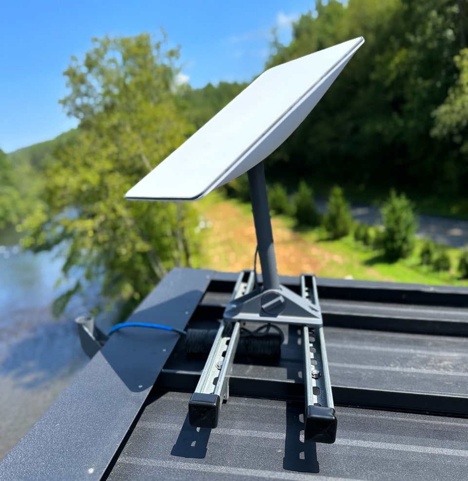 Satellite dish mounted to standing seam roof using a SataMount kit.