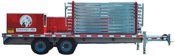 Specialized machine for continuous on-site forming and curving of self-supporting arch metal roofs. Image courtesy of www.Zimmerman-Metals.com.