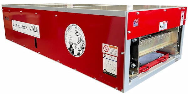 Compact on-site rollformer designed for residential contractors to produce custom width standing seam panels. Image courtesy of www.Zimmerman-Metals.com.